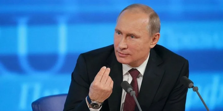 Путин