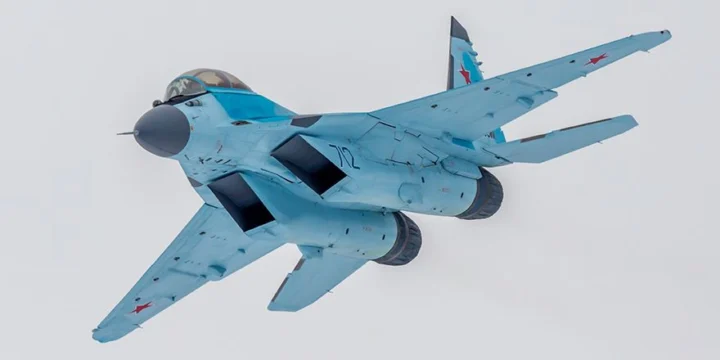 MiG 35 712 blue in flight